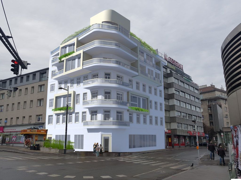 Mehrstöckiges weißes Gebäude mit abgerundeten Balkonen an einer Straßenecke in einer Stadt